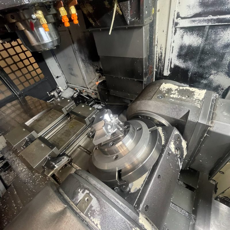 Interior of a CNC mill mid-cycle